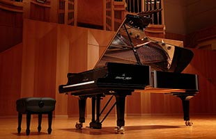 Shigeru Kawai SK-EX concert grand piano in concert hall