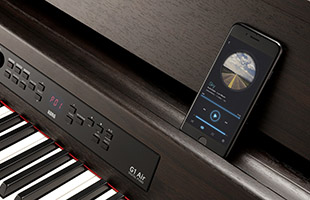 detail image of Korg G1B Air digital piano keybed and music rest with smartphone resting on the music rest