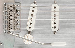 detail image of Fender H.E.R. Stratocaster showing tremolo bridge hardware