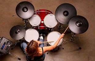 top view of drummer playing Roland BAD706